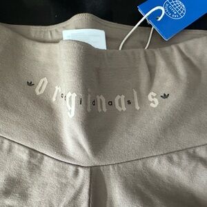 Beige adidas biker shorts